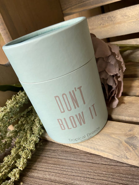 Wit- seriously funny candle in a jar. Aqua blue/green