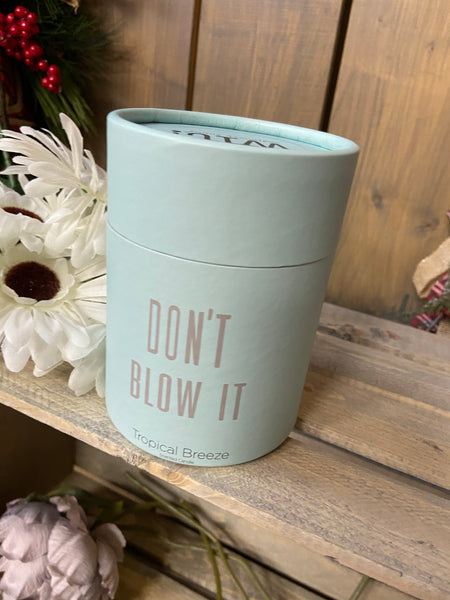 Wit- seriously funny candle in a jar. Aqua blue/green