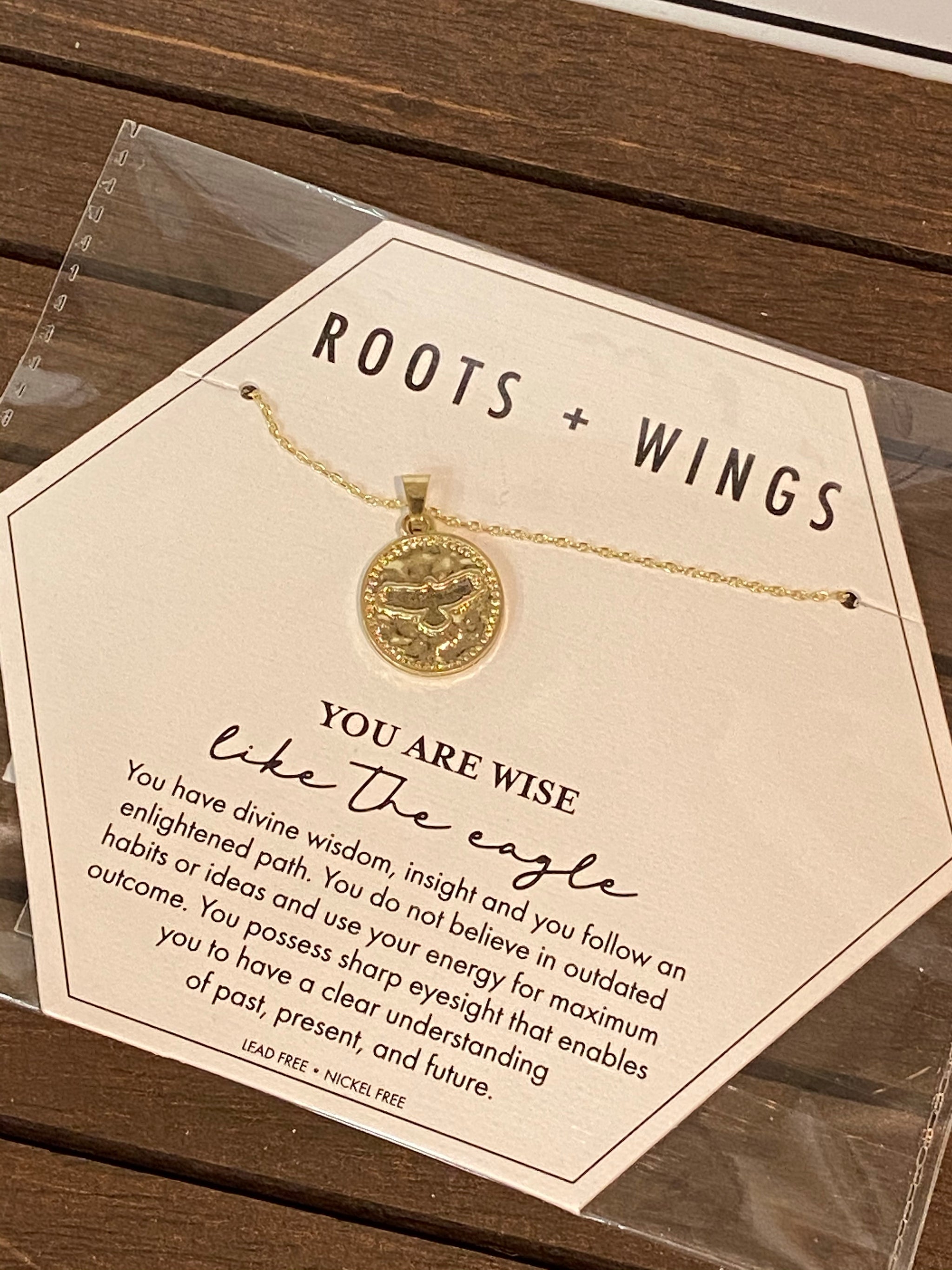 Roots and wings necklace deals